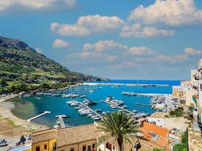 a view of a harbor with boats in the water at Dimora Puccini by Holiday World in Castellammare del Golfo