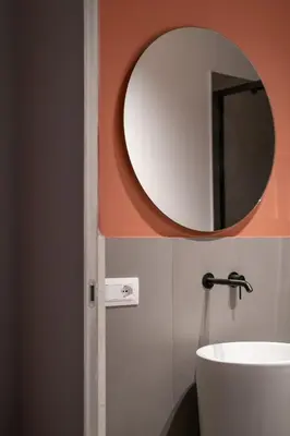 a bathroom with a mirror and a sink at Corallo - Cantunera Old Town Apartments in Palermo