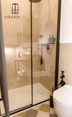a bathroom with a shower with a toilet and a sink at Maqueda 259 - In Palermo's Lively Heart in Palermo