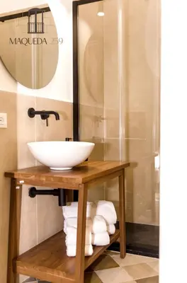 a bathroom with a sink and a shower at Maqueda 259 - In Palermo's Lively Heart in Palermo