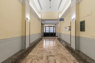 an empty hallway with a door in a building at Panurban Apartments by Wonderful Italy in Palermo