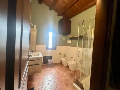 a bathroom with a sink and a mirror at Thalea Apartment in Palermo