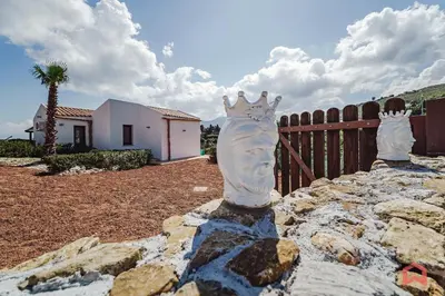 a view from the top of a hill with flowers at Panoramic Villa with private Pool near Scopello in Scopello