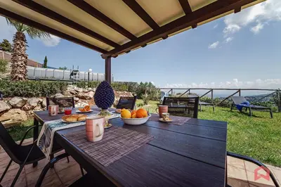 a small house on a hill with a garden at Panoramic Villa with private Pool near Scopello in Scopello