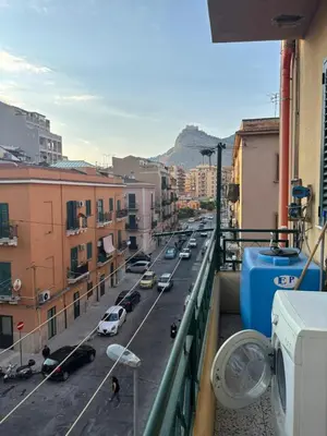 a view of a city street from a balcony at Alessandra guesting house - Palermo in Palermo