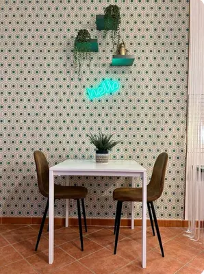 a white table with two chairs in a room at Casamori 2- nel cuore di Palermo, mercato Ballarò in Palermo