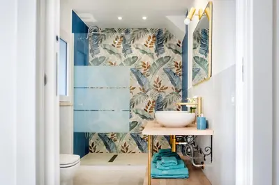 a bathroom with a sink and a toilet at Colonna Secret, Private Jacuzzi in Historic Center in Palermo