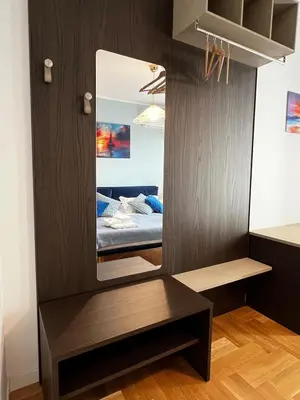 a mirror in a room with a bed at Guardian Dream Suite House nel cuore di Palermo in Palermo