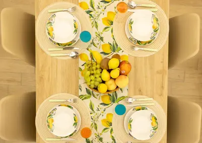 a kitchen with a table with a table cloth on it at Lemora in Palermo