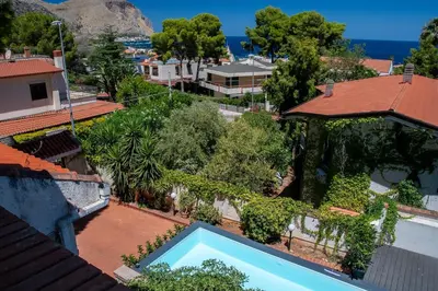 an aerial view of a house with a swimming pool at LuminHouse Addaura Pool in Palermo