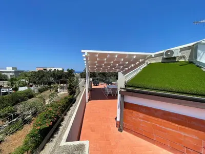 a roof garden on a house with a green roof at Casetta Ciurì in Terrasini