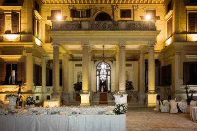 a banquet hall with white tables in a building at xxxxx in Palermo