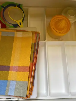 a plastic tray with a purse and other items at Sunny Apartament in Palermo