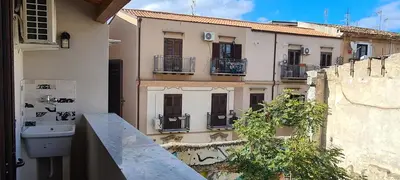 a view of a building from a balcony at Le Gemme di Ballarò in Palermo