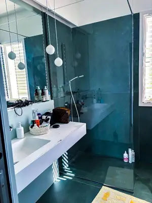 a bathroom with a sink and a mirror at Palermo sul mare di Isola delle Femmine in Isola delle Femmine