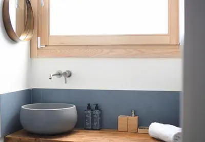 a bathroom with a bowl sink and a window at iFlat Casa di Design nella piazzetta in Palermo