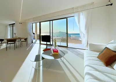 a living room with a couch and a table at Solemar Sicilia - Villa Gloria in Ficarazzi
