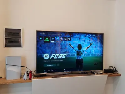 a large television screen with a soccer game on it at Cielo D'Alcamo Palazzo Mazzini in Alcamo