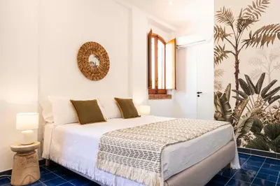 a bedroom with a bed in a room at Casa D'Acquisto in Santa Flavia