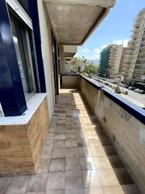 a balcony of a building with a view of a city at Palermo Home in Palermo