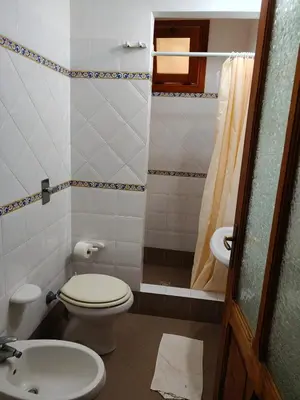 a bathroom with a toilet and a sink at Le Case di Sole San Vito Lo Capo in San Vito lo Capo