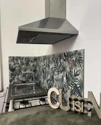 a kitchen with a stainless steel stove top oven at Dimora Filangeri in Santa Flavia