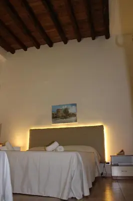 a bedroom with a bed in a room at Giacalone15 - EXCLUSIVE APARTMENT IN THE HISTORIC CENTER NEAR THE TEATRO MASSIMO in Palermo