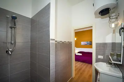 a bathroom with a shower and a sink at Affittacamere le scale in Castellammare del Golfo
