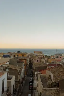 a view of a city with the ocean in the background at Affittacamere le scale in Castellammare del Golfo