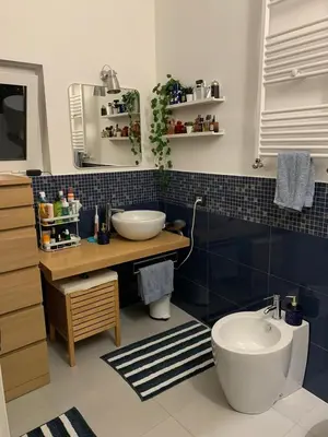 a bathroom with a sink and a toilet at Dimora Stella Boutique in Alcamo