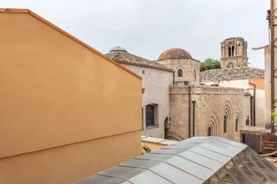 a view of a church from the roof of a building at Bellini Apartment by Wonderful Italy in Palermo