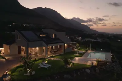 an aerial view of a house with a swimming pool at Villa Aversa by PosarelliVillas in Castellammare del Golfo