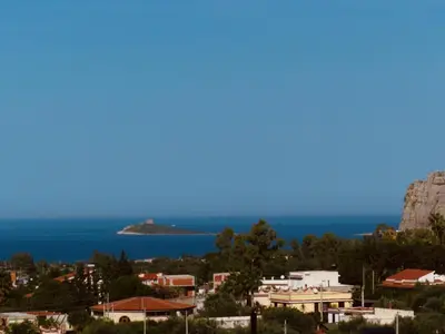 a view of the ocean from a city at Dimidia - casa vacanze mare montagna in Capaci