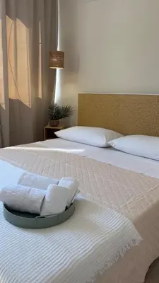 two beds with towels sitting on top of them at Ciàuru di mari Mondello apartment and terrace in Palermo