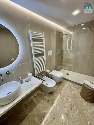 a bathroom with a sink and a toilet and a tub at Palermo Central Rooms in Palermo