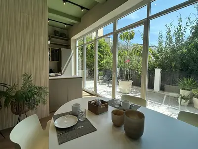 a room with a closet with a window and shelves at YourLife Suite2 - Deliziosa casa con terrazza in Palermo