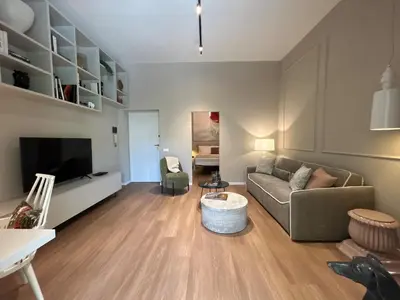 a dining room with a white table and chairs at YourLife Suite2 - Deliziosa casa con terrazza in Palermo
