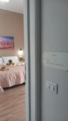 a bedroom with a bed in a room at Casa Vacanze Cipriano in Casteldaccia