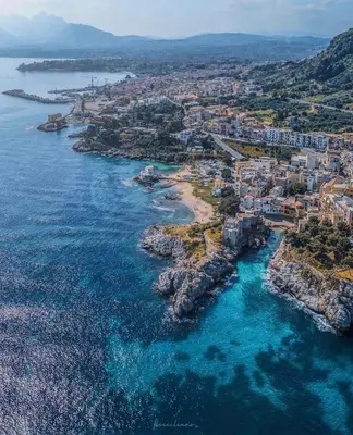 an aerial view of a city and the ocean at Pearl in Santa Flavia