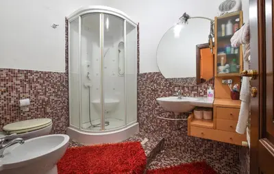 a bathroom with a shower and a sink at Cozy Apartment In Trappeto With Wifi in Trappeto