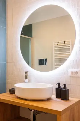 a bathroom with a white sink and a mirror at Don Federico Apartment in Palermo