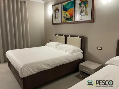 a bedroom with two beds with white sheets at Pesco Rooms Marineo in Marineo