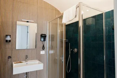 a bathroom with a shower and a sink at Cielo D'Alcamo Palazzo Oliva in Alcamo
