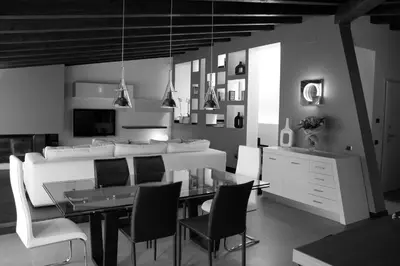 a dining room with a table and chairs at Imbriani103 in Cinisi