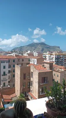a view of a city with buildings at dimora sammartino in Palermo