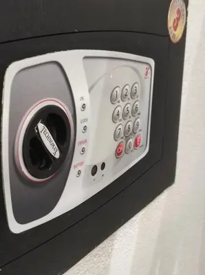 a black and white microwave oven attached to a wall at SottoCapo House in Palermo