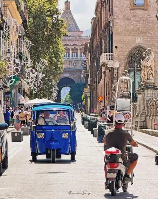 a group of people riding in a blue at SottoCapo House in Palermo