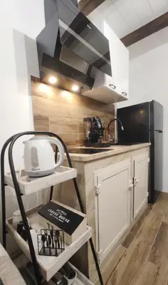 a kitchen with a sink and a counter top at SottoCapo House in Palermo