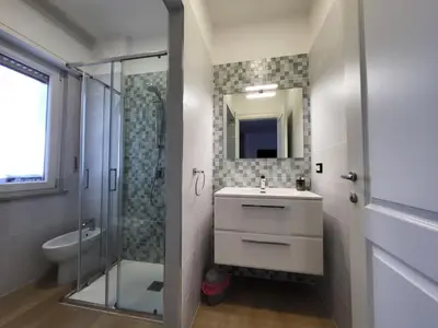 a bathroom with a sink and a shower and a toilet at Dante Prime Collection Palermo in Palermo