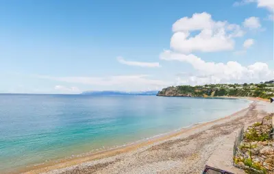 a view of a beach with the ocean at Villa Bruno in Castellammare del Golfo